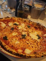 Neapolitan Pizza with Basil and Cheese